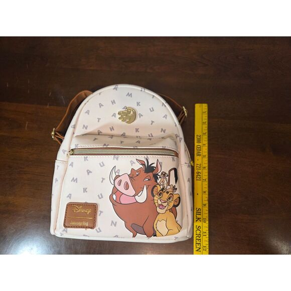 ​Disney Loungefly Lion King Hakuna Matata Mini Backpack Simba Pumbaa Timon Cream